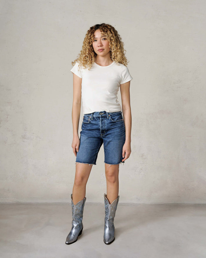 EDWIN high quality jean shorts for women in blue with a casual fit and frayed hem