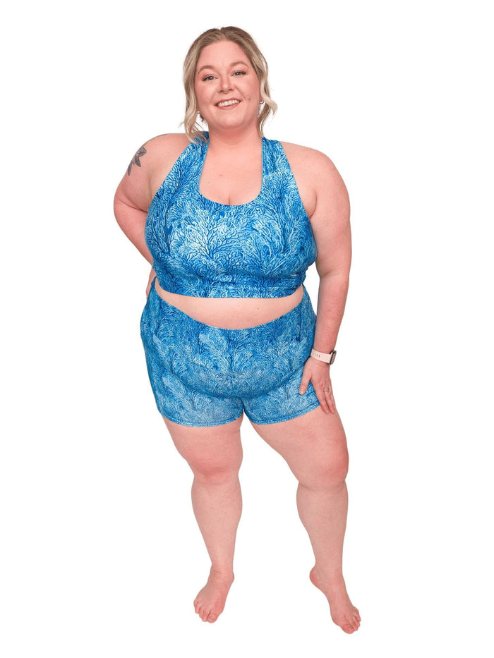 Model: Chelsea is a marine conservationist who believes that science is for everybody… and every BODY! She is 5'2", 230 lbs, 40DD and is wearing 3XL shorts and a 3XL reversible top.