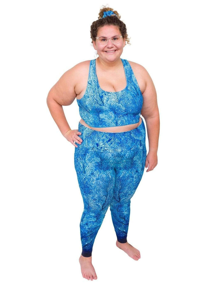 Model: Angela is working towards her Master of Professional Science in Marine Conservation. She is 5'6", 235 lbs, 42E and is wearing a 2XL top and legging.