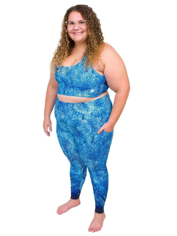 Model: Angela is working towards her Master of Professional Science in Marine Conservation. She is 5'6", 235 lbs, 42E and is wearing a 2XL top and legging.
