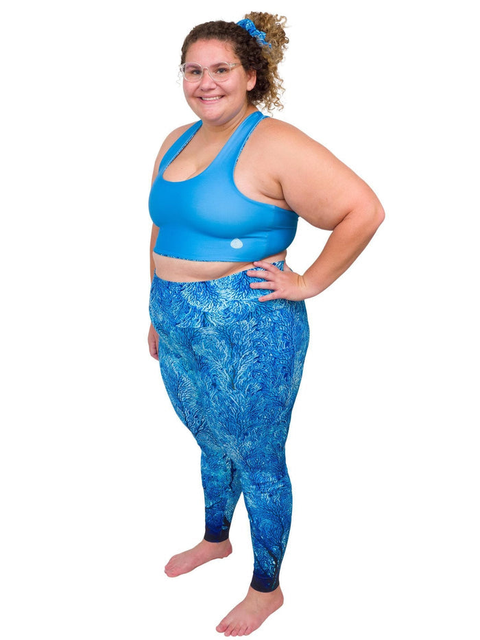 Model: Angela is working towards her Master of Professional Science in Marine Conservation. She is 5'6", 235 lbs, 42E and is wearing a 2XL top and legging.