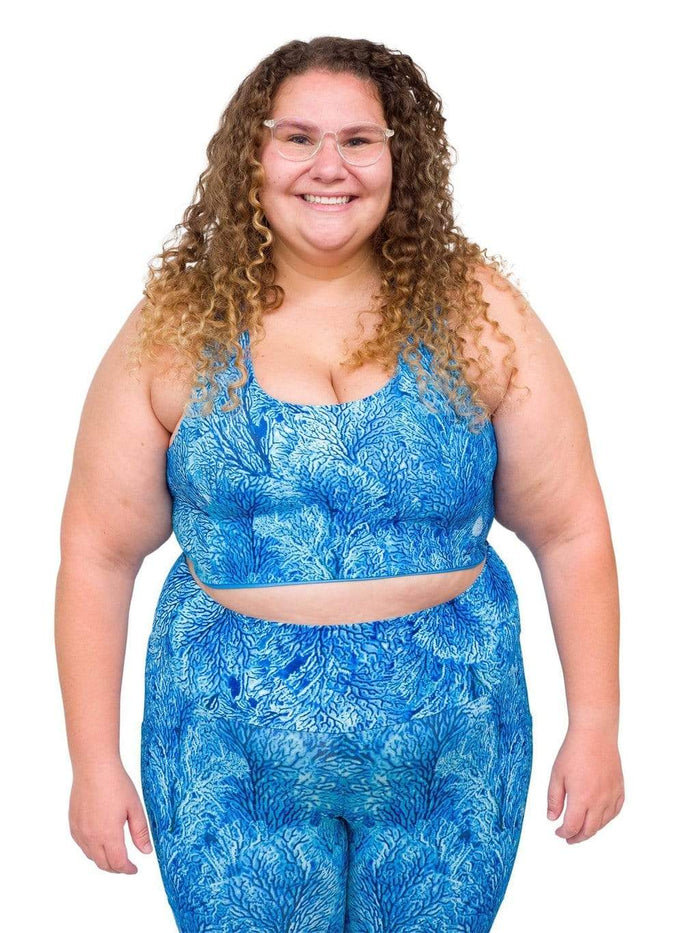 Model: Angela is working towards her Master of Professional Science in Marine Conservation. She is 5'6", 235 lbs, 42E and is wearing a 2XL top and legging.