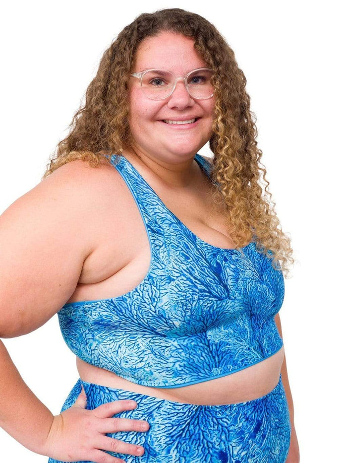 Model: Angela is working towards her Master of Professional Science in Marine Conservation. She is 5'6", 235 lbs, 42E and is wearing a 2XL top and legging.