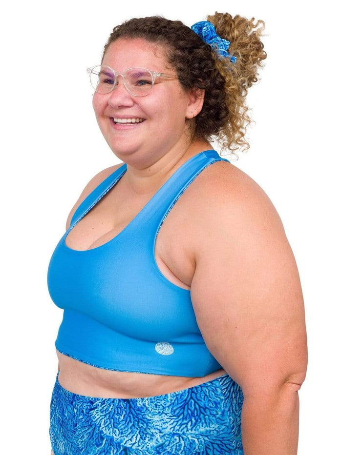 Model: Angela is working towards her Master of Professional Science in Marine Conservation. She is 5'6", 235 lbs, 42E and is wearing a 2XL top and legging.