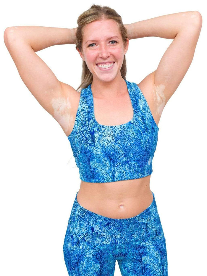 Model: Leah is an Aquarium Biologist at Mote Marine Laboratory and Aquarium and strives to use her work in animal care to inspire guests to love, appreciate and conserve our oceans and wildlife. She is 5'6", 140 lbs, 36B and is wearing a size S top and M legging.