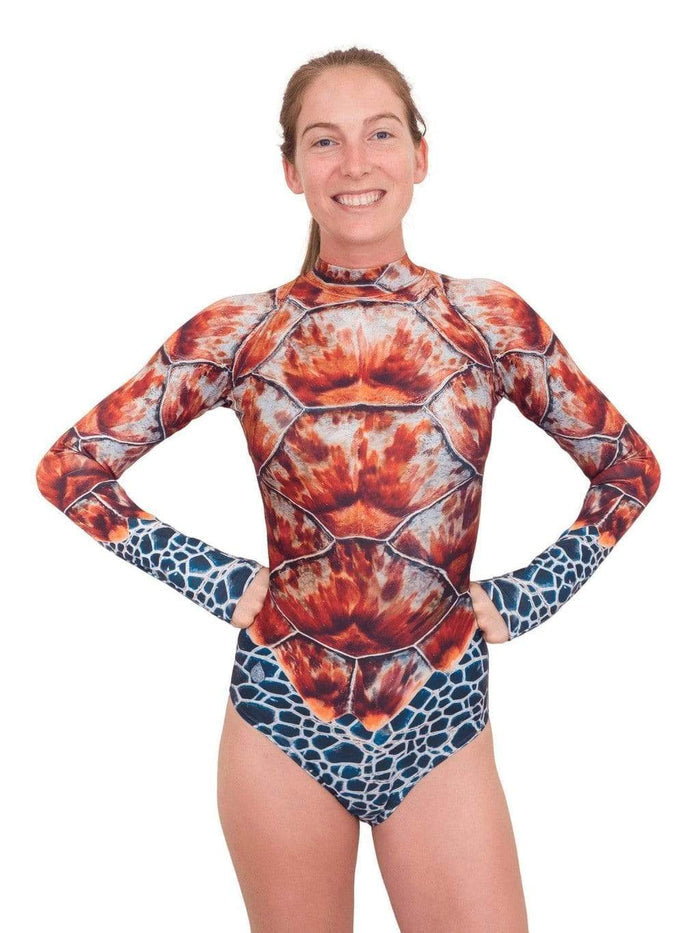 Model: Fiona is the COO here at Waterlust, has a master's degree in Marine Affairs and Policy, and is a surfer, kiter and scuba diver. She is 5'9", 135 lbs, 34B and is wearing a S.