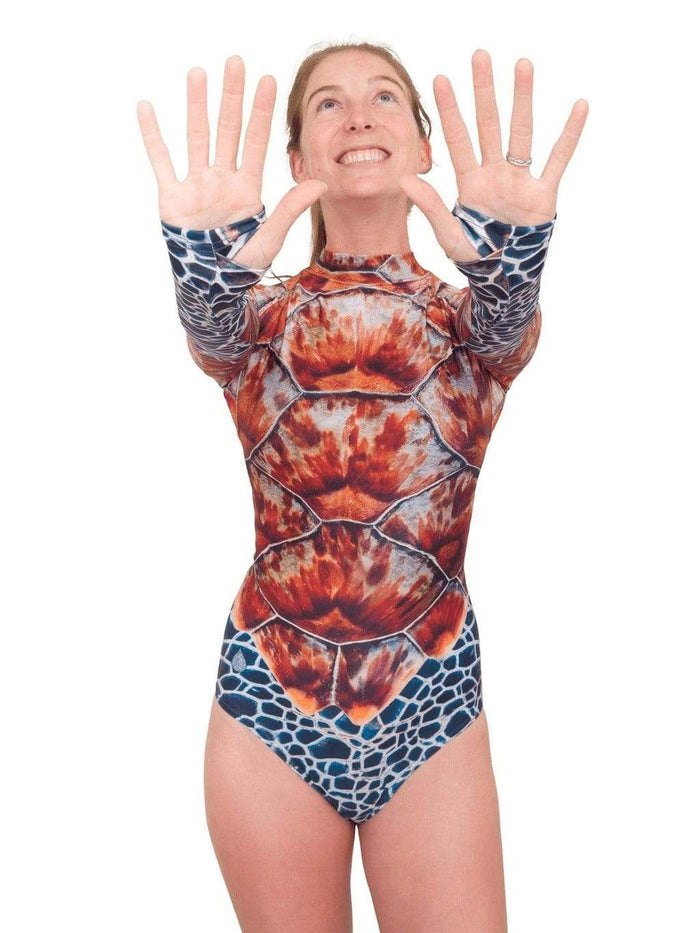 Model: Fiona is the COO here at Waterlust, has a master's degree in Marine Affairs and Policy, and is a surfer, kiter and scuba diver. She is 5'9", 135 lbs, 34B and is wearing a S.