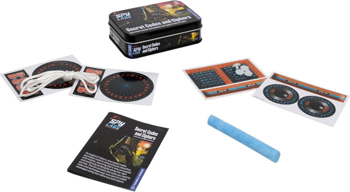 Spy game set with codes, decoder, and instructions on a white background
