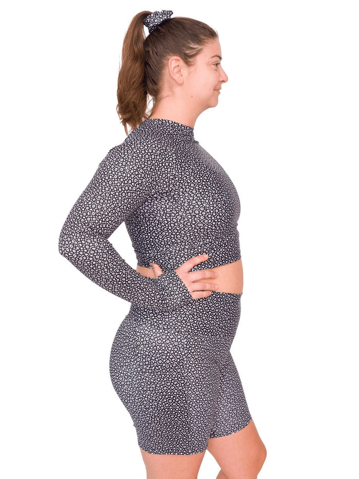 Model: Camilla is the operations manager here at Waterlust. She loves using her camera to communicate marine conservation issues. She is 5’8”, 180 lbs, 36B and is wearing a size L top and XL short.
