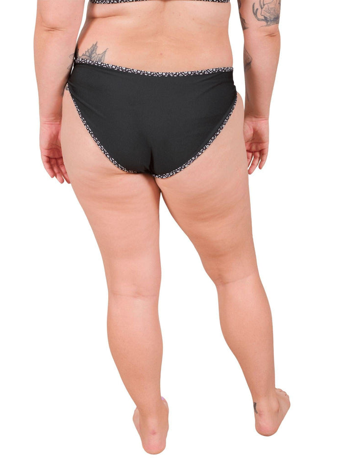 Model: Camilla is the Operations Manager here at Waterlust. She loves using her camera to communicate marine conservation issues. She is 5'8", 195 lbs and is wearing an XL Classic Bikini Bottom.
