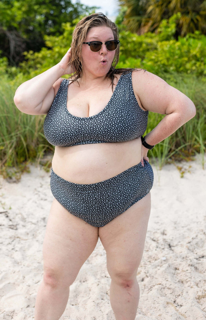 Model: Chelsea is a marine conservationist who believes that science is for everybody… and every BODY! She is 5'2", 230 lbs, 42F and is wearing a 3XL Scoop Bikini Top and 2XL High-Waisted Bikini Bottom.