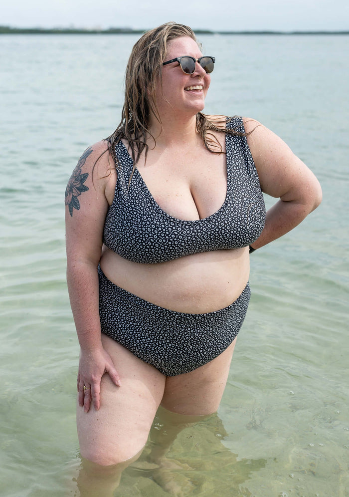 Model: Chelsea is a marine conservationist who believes that science is for everybody… and every BODY! She is 5'2", 230 lbs, 42F and is wearing a 3XL Scoop Bikini Top and 2XL High-Waisted Bikini Bottom.