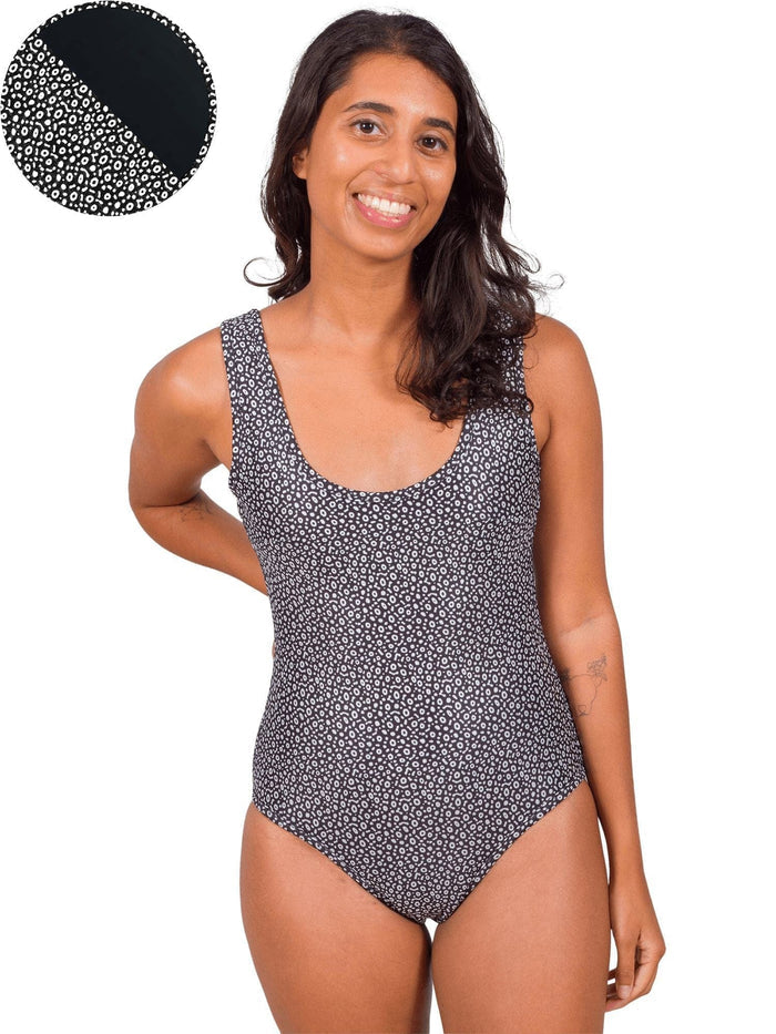 Model: Michelle is a marine science educator, coral reef ecologist, and scientific diver. She is 5'3", 111lbs, 32A and is wearing a size XS One-Piece Swimsuit.