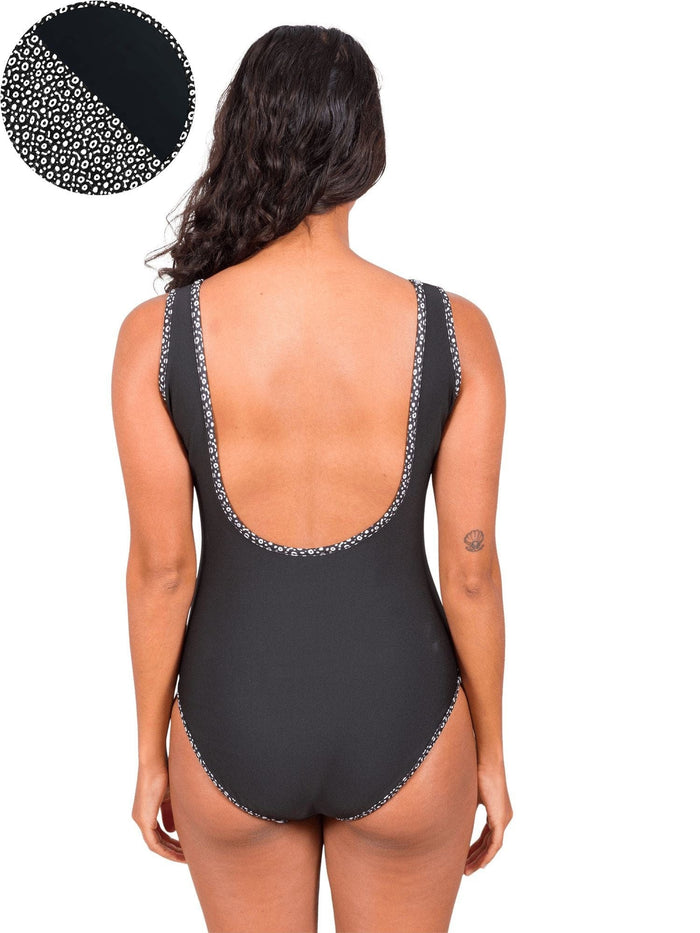 Model: Michelle is a marine science educator, coral reef ecologist, and scientific diver. She is 5'3", 111lbs, 32A and is wearing a size XS One-Piece Swimsuit.