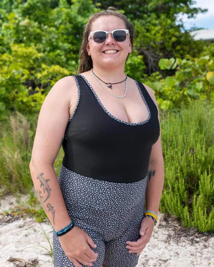 Model: Jenny is a Masters student researching the movement and habitat use of the Atlantic Guitarfish using acoutic telemetry. She is 5'9", 185 lbs, 36D and wearing an XL One-Piece Swimsuit and XL 8 inch Shorts.