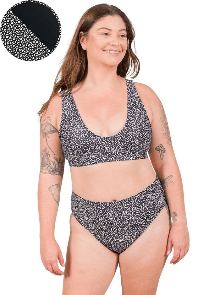 Model: Camilla is the Operations Manager here at Waterlust. She loves using her camera to communicate marine conservation issues. She is 5'8", 195 lbs, 36D and is wearing an XL Scoop Bikini Top and XL Classic Bikini Bottom.