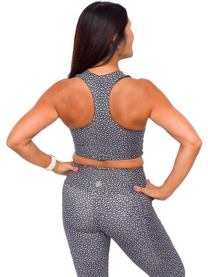 Model: Donna is a yoga teacher whose goal is to empower her students by using yoga to create deeper connections with themselves and with nature. She is 5'2", 125 lbs, 34B and is wearing a S top and legging.