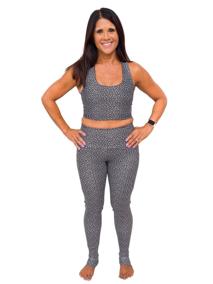 Model: Donna is a yoga teacher whose goal is to empower her students by using yoga to create deeper connections with themselves and with nature. She is 5'2", 125 lbs, 34B and is wearing a S top and legging.