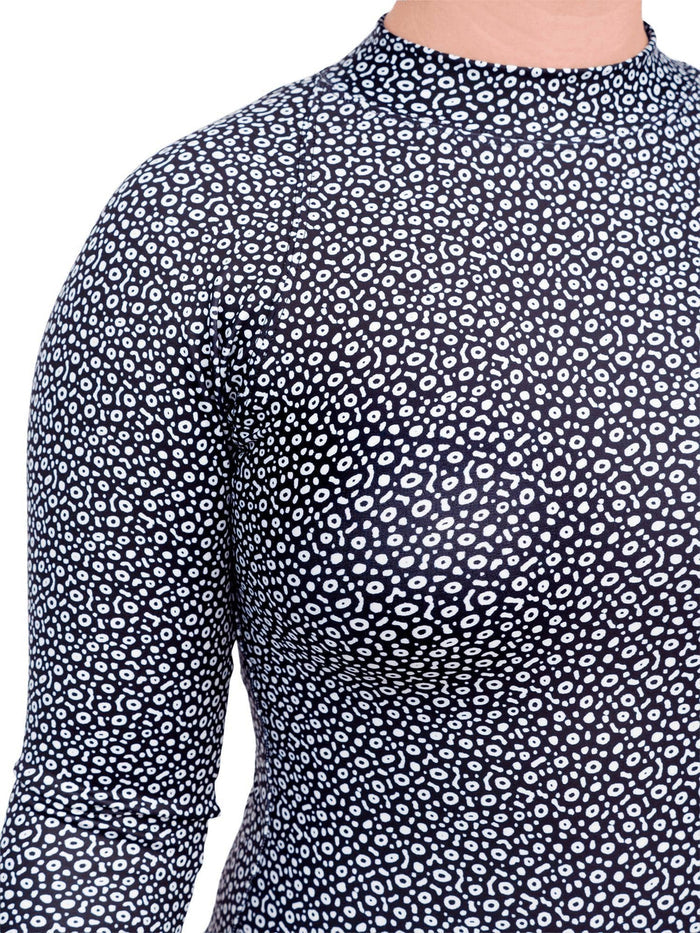 Close up front view of spotted eagle ray sun suit