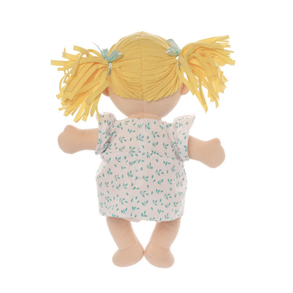 Back view of Plush doll with blonde hair and floral dress