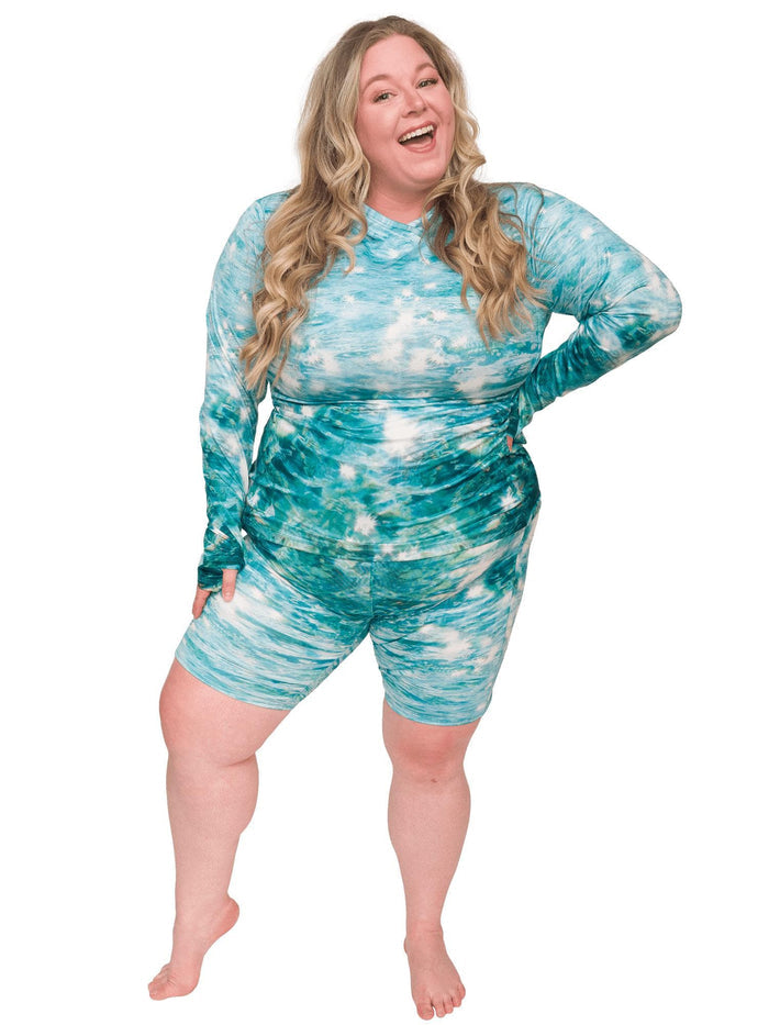 Model: Chelsea is a marine conservationist who believes that science is for everybody… and every BODY! She is 5'2", 230 lbs, 40DD and is wearing 3XL shorts and sun shirt.