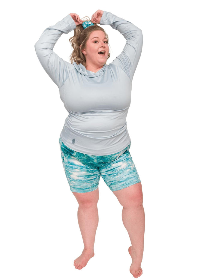 Model: Chelsea is a marine conservationist who believes that science is for everybody… and every BODY! She is 5'2", 230 lbs, 40DD and is wearing 3XL shorts and sun shirt.