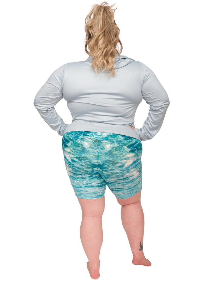 Model: Chelsea is a marine conservationist who believes that science is for everybody… and every BODY! She is 5'2", 230 lbs, 40DD and is wearing 3XL shorts and sun shirt.