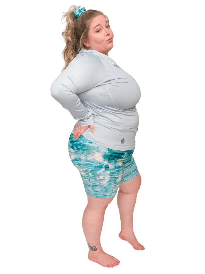 Model: Chelsea is a marine conservationist who believes that science is for everybody… and every BODY! She is 5'2", 230 lbs, 40DD and is wearing 3XL shorts and sun shirt.