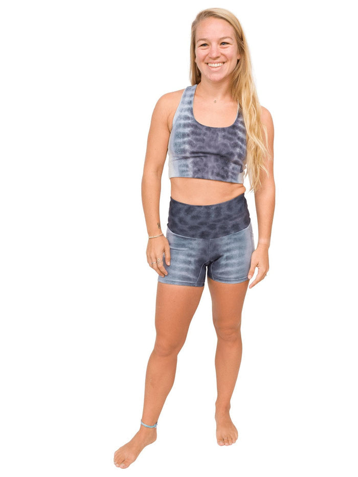 Model: Erin is a coral ecologist and Program Manager here at Waterlust. She 4'11", 110 lbs, 32A and is wearing an XS short and XS top.