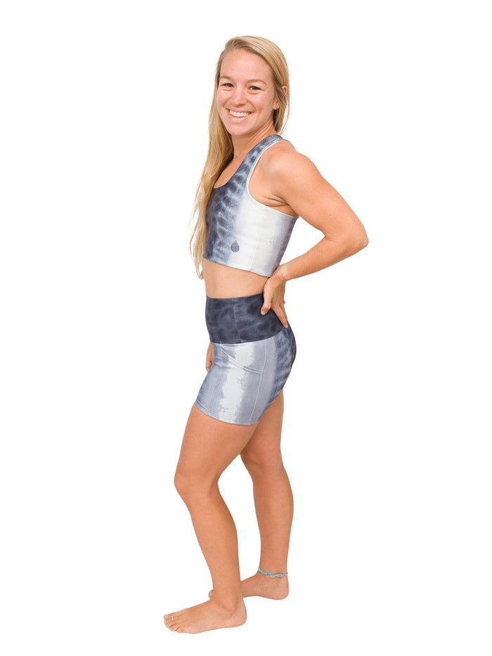Model: Erin is a coral ecologist and Program Manager here at Waterlust. She 4'11", 110 lbs, 32A and is wearing an XS short and XS top.