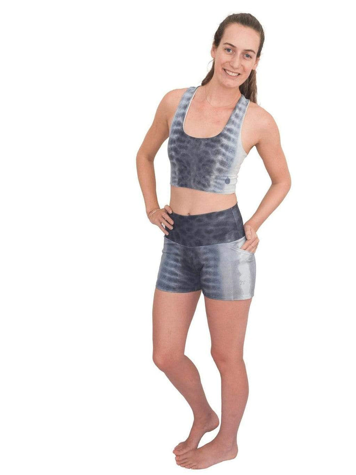 Model: Laura is our Chief Product Officer at Waterlust, a scuba diver, kiter and recreational yogi. She is 5’10, 147 lbs, 34B and is wearing a size S top and M short.