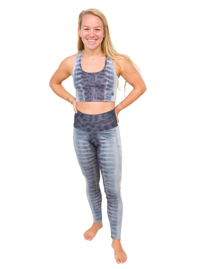 Model: Erin is a coral ecologist and Program Manager here at Waterlust. She 4'11", 110 lbs, 32A and is wearing an XS short and XS top.