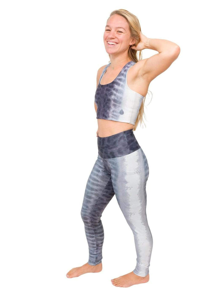 Model: Erin is a coral ecologist and Program Manager here at Waterlust. She 4'11", 110 lbs, 32A and is wearing an XS short and XS top.
