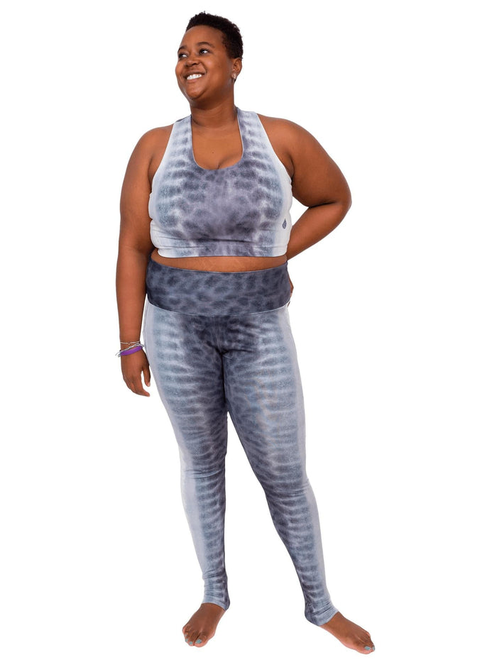 Model: Candace is a PhD candidate in the Predator Ecology & Conservation Lab at FIU and the first Bahamian scientist dedicated specifically to shark research. She is 5'9", 230 lbs, and is wearing a 3XL top and 2XL leggings.