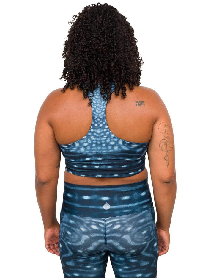Model: Amani is the CFO of Minorities in Shark Sciences and a shark scientist. She is 5'3", 160 lbs, 36C and is wearing a M legging and L top.