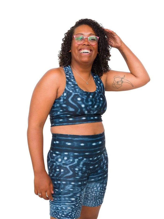 Model: Amani is the CFO of Minorities in Shark Sciences and a shark scientist. She is 5'3", 160 lbs, 36C and is wearing a M legging and L top.