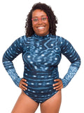 Model: Amani is the CFO of Minorities in Shark Sciences and a shark scientist. She is 5'3", 160 lbs, 36C and is wearing a M.