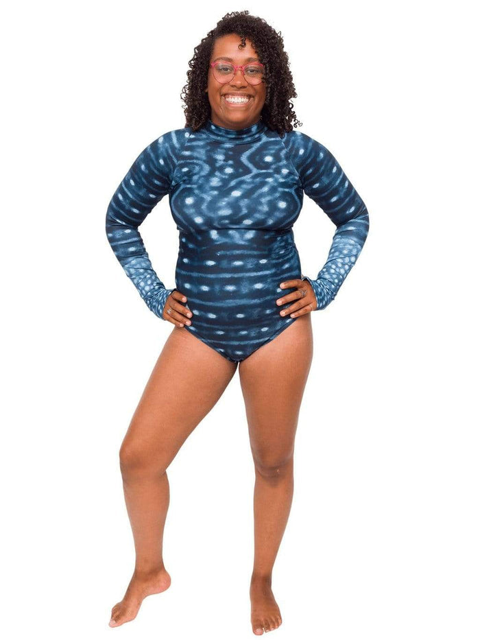Model: Amani is the CFO of Minorities in Shark Sciences and a shark scientist. She is 5'3", 160 lbs, 36C and is wearing a M.