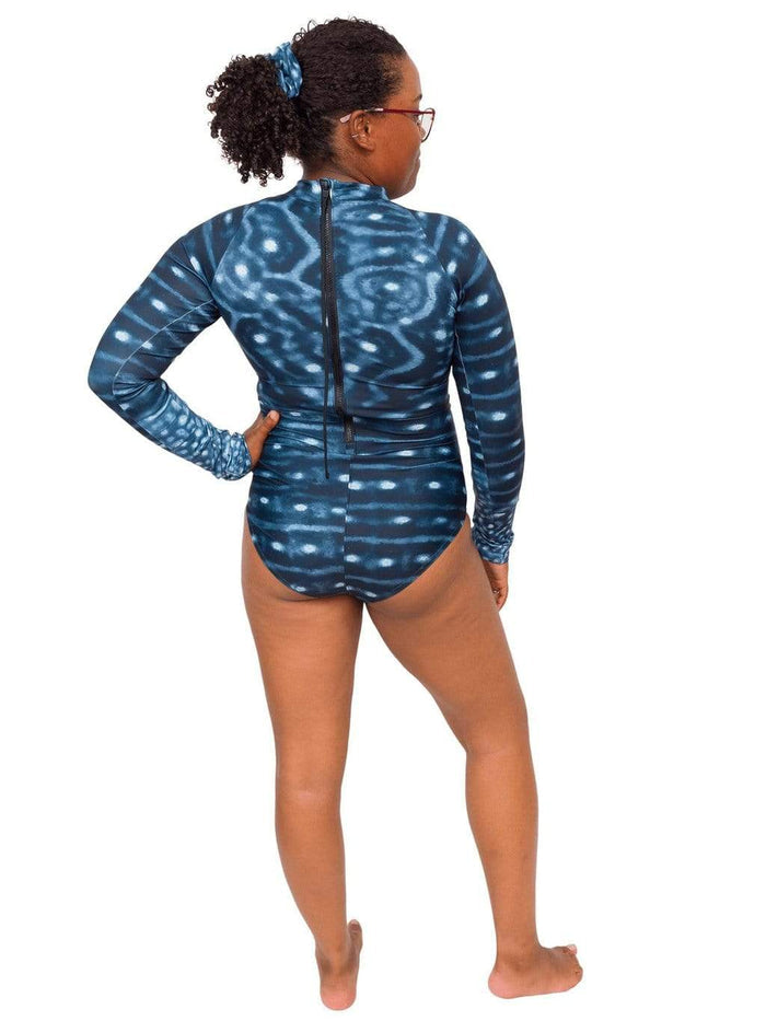 Model: Amani is the CFO of Minorities in Shark Sciences and a shark scientist. She is 5'3", 160 lbs, 36C and is wearing a M.