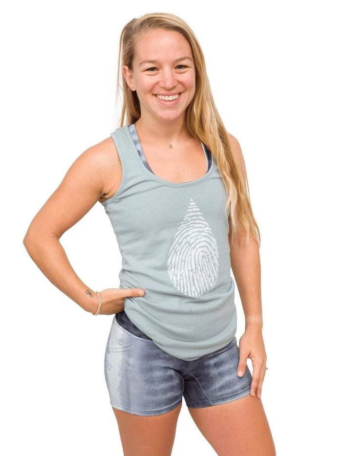 Model: Erin is a coral ecologist and Program Manager here at Waterlust. She 4'11", 110 lbs, 32A and is wearing an XS short and XS tank.