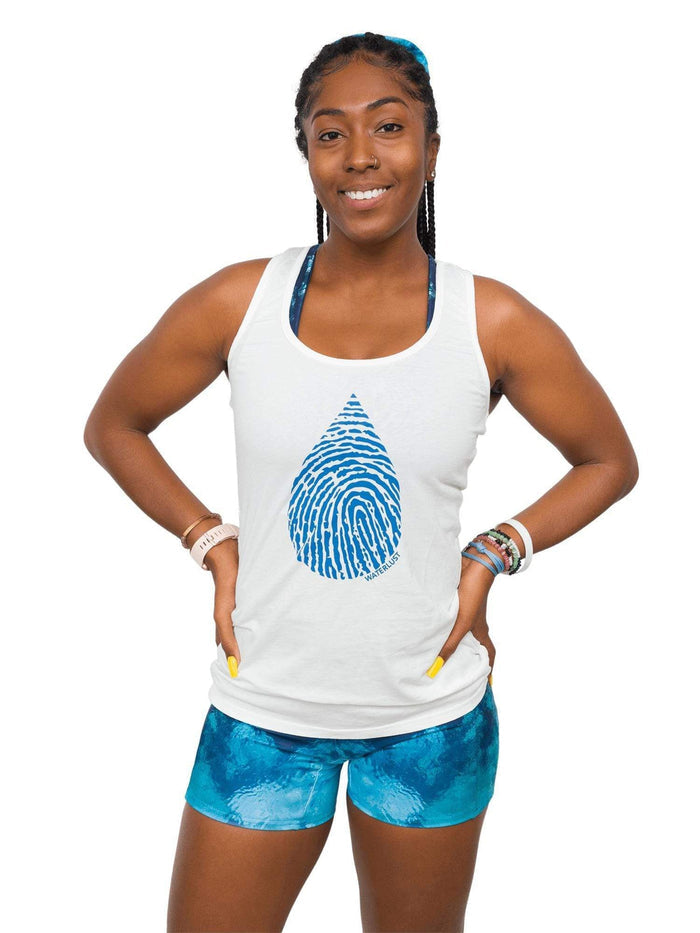 Model: Carlee is a shark & sea turtle scientist and co-founder of Minorities in Shark Sciences. She is 5'7", 145 lbs, 36C and is wearing a M tank and M shorts..
