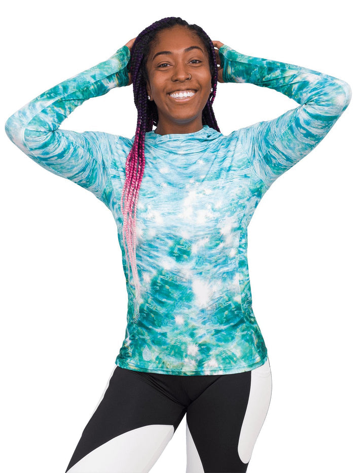 Model: Carlee is a shark & sea turtle scientist and co-founder of Minorities in Shark Sciences. She is 5’7”, 145 lbs, 36C and is wearing a S sun shirt and M legging.