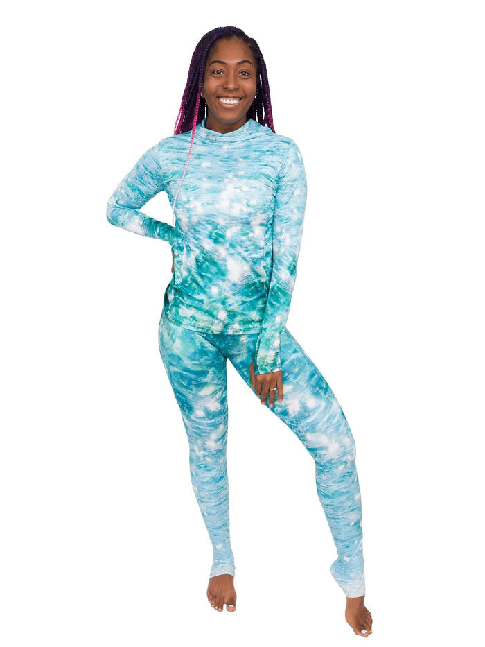 Model: Carlee is a shark & sea turtle scientist and co-founder of Minorities in Shark Sciences. She is 5’7”, 145 lbs, 36C and is wearing a S sun shirt and M legging.