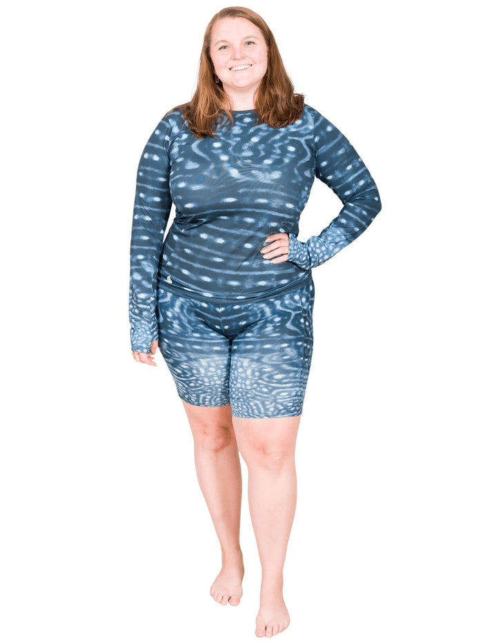 Model: Erin works to educate students and the community about conservation issues in South Florida. She is 5'5", 225lbs, and  is wearing a XL Women's Crew Neck Sun Shirt with a 3XL short.